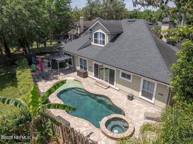 2918 Grande Oaks Way, Fleming Island, FL 32003 - view of pool featuring a fenced backyard, a patio area, a pergola, and a pool with connected hot tub
