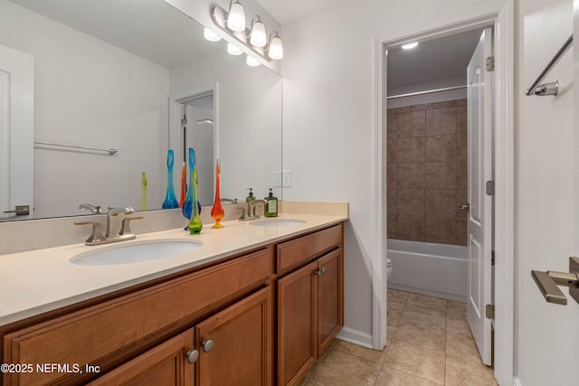 271 Roaring Brook Dr, Saint Augustine, FL 32084 - bathroom featuring double vanity, tile patterned floors, toilet, baseboards, and shower / tub combination