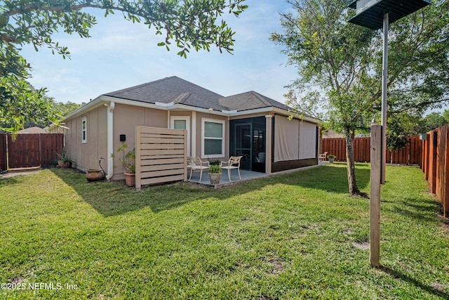 271 Roaring Brook Dr, Saint Augustine, FL 32084 - rear view of property featuring a sunroom, a patio area, and roof with shingles