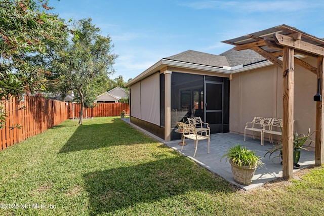 271 Roaring Brook Dr, Saint Augustine, FL 32084 - view of yard featuring a sunroom and a patio area