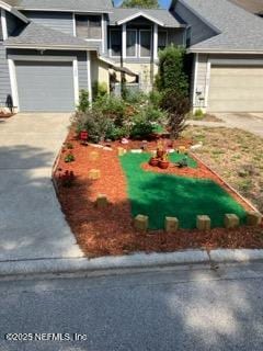 1188 Fromage Way, Jacksonville, FL 32225 - view of front of house featuring driveway and a garage