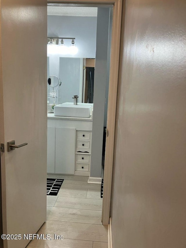 1188 Fromage Way, Jacksonville, FL 32225 - bathroom with vanity and wood finished floors