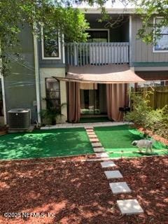 1188 Fromage Way, Jacksonville, FL 32225 - rear view of house with a balcony and central AC unit