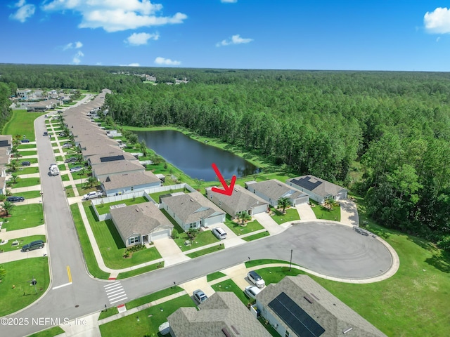 36 Grand Par Ct, Bunnell, FL 32110 - aerial overview of property's location featuring a heavily wooded area and a large body of water