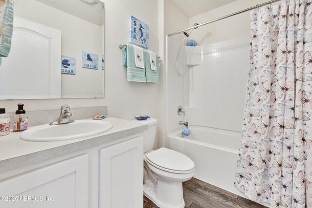 36 Grand Par Ct, Bunnell, FL 32110 - full bath with wood finished floors, shower / bathtub combination with curtain, vanity, and toilet