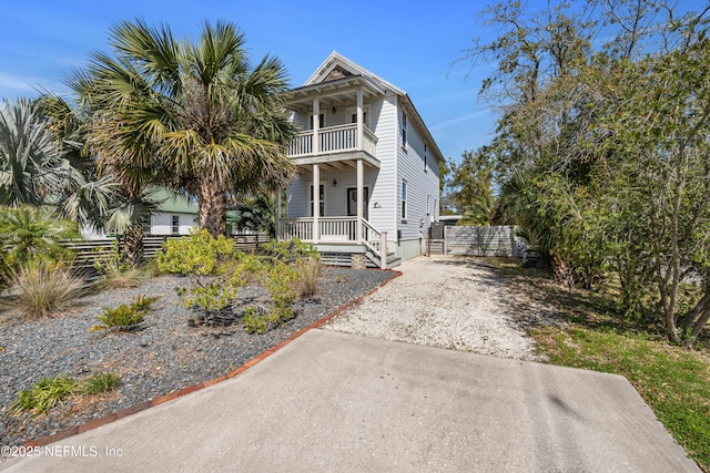 171 Twine St, Saint Augustine, FL 32084 - view of front of house featuring a balcony and a porch