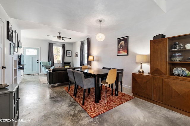 171 Twine St, Saint Augustine, FL 32084 - dining room featuring finished concrete floors, a ceiling fan, and baseboards