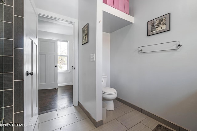 171 Twine St, Saint Augustine, FL 32084 - bathroom with toilet, baseboards, and tile patterned floors