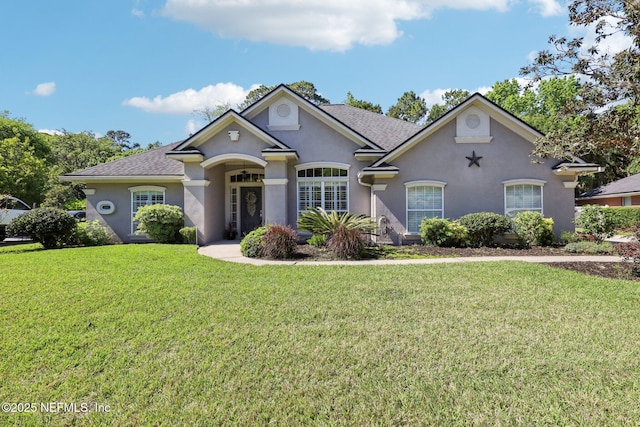 232 Shell Bluff Ct, Ponte Vedra Beach, FL 32082 - view of front facade with stucco siding, a front yard, and a shingled roof