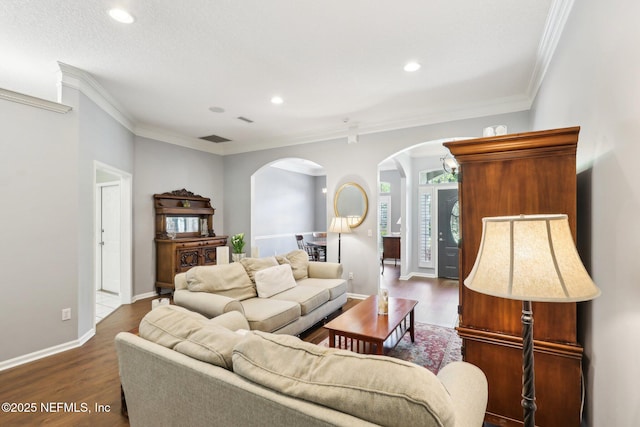 232 Shell Bluff Ct, Ponte Vedra Beach, FL 32082 - living area featuring arched walkways, ornamental molding, wood finished floors, recessed lighting, and baseboards