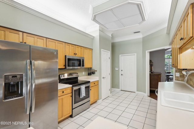 232 Shell Bluff Ct, Ponte Vedra Beach, FL 32082 - kitchen featuring stainless steel appliances, crown molding, light tile patterned floors, a sink, and light countertops