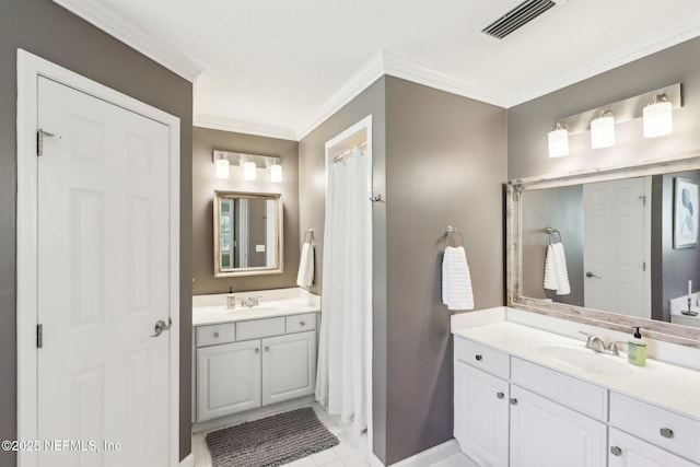 232 Shell Bluff Ct, Ponte Vedra Beach, FL 32082 - full bath with two vanities, crown molding, baseboards, and tile patterned floors