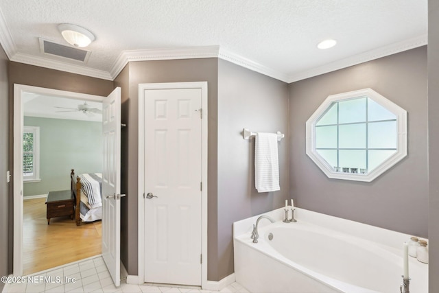 232 Shell Bluff Ct, Ponte Vedra Beach, FL 32082 - full bathroom featuring a garden tub, baseboards, ornamental molding, a textured ceiling, and ceiling fan