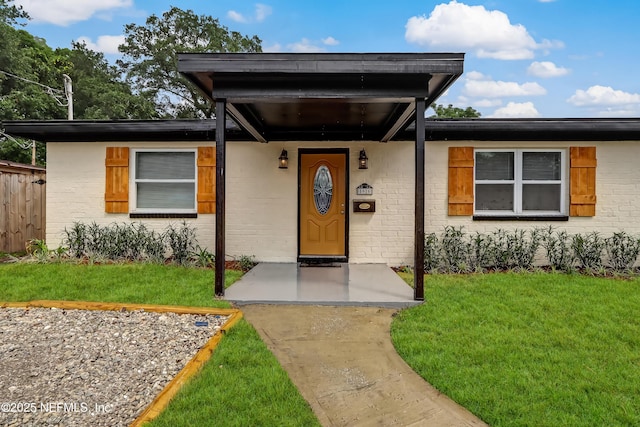 5916 Redberry Ln, Jacksonville, FL 32211 - property entrance with brick siding