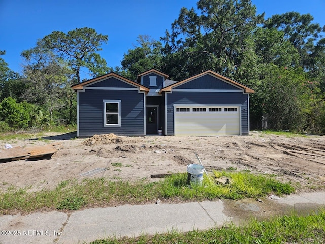 2839 Palmdale St, Jacksonville, FL 32208 - view of front facade with a garage