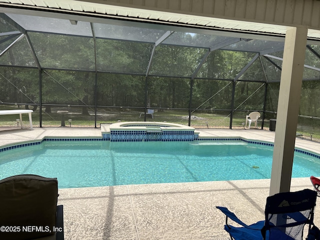 2840 Blackberry Ave, Middleburg, FL 32068 - view of pool with a pool with connected hot tub, a patio area, and a lanai