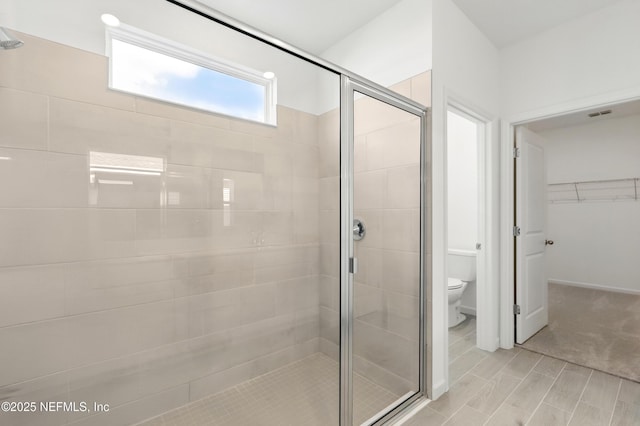9053 Whinny Way, Jacksonville, FL 32219 - full bathroom with toilet, a shower stall, and a spacious closet