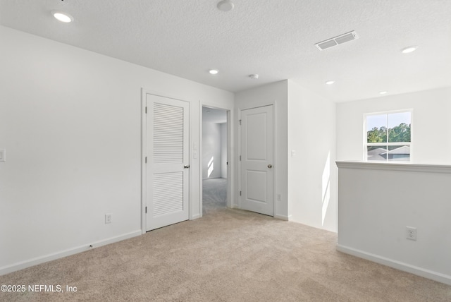 9053 Whinny Way, Jacksonville, FL 32219 - carpeted empty room featuring a textured ceiling, recessed lighting, and baseboards