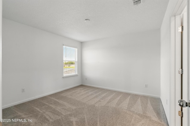 9053 Whinny Way, Jacksonville, FL 32219 - unfurnished room with carpet flooring, a textured ceiling, and baseboards