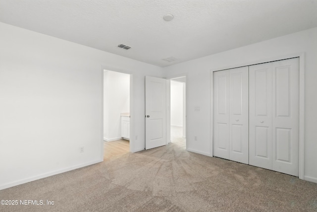 9053 Whinny Way, Jacksonville, FL 32219 - unfurnished bedroom with carpet, baseboards, and a closet
