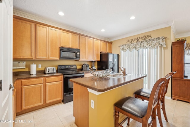 5346 Brighton Park Ln, Jacksonville, FL 32210 - kitchen featuring black appliances, a sink, crown molding, light tile patterned flooring, and a kitchen bar