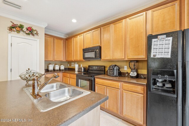 5346 Brighton Park Ln, Jacksonville, FL 32210 - kitchen with black appliances, a sink, ornamental molding, light tile patterned flooring, and recessed lighting