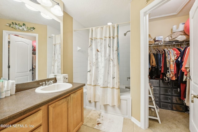 5346 Brighton Park Ln, Jacksonville, FL 32210 - full bathroom featuring vanity, shower / bath combo, a walk in closet, and tile patterned flooring