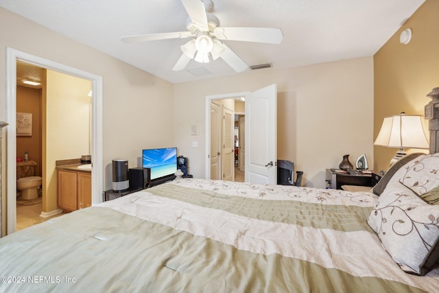 5346 Brighton Park Ln, Jacksonville, FL 32210 - bedroom featuring connected bathroom and a ceiling fan