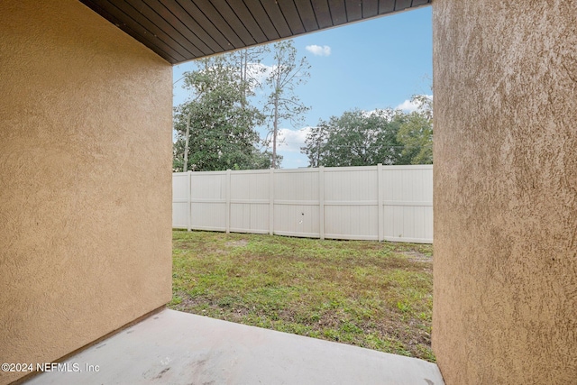 5346 Brighton Park Ln, Jacksonville, FL 32210 - view of yard with a patio area