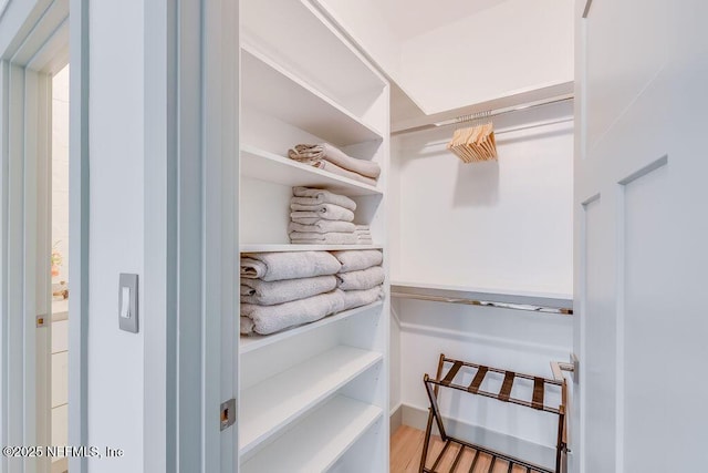 66 Oneida St, Saint Augustine, FL 32084 - spacious closet featuring wood finished floors