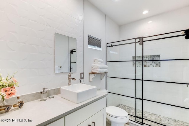 66 Oneida St, Saint Augustine, FL 32084 - full bathroom with a stall shower, vanity, and toilet