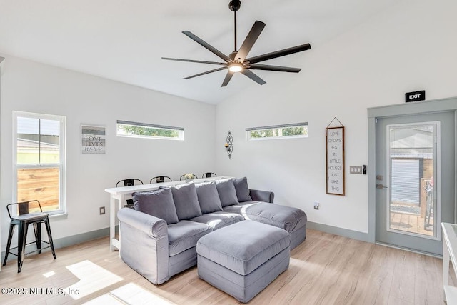 66 Oneida St, Saint Augustine, FL 32084 - living area featuring ceiling fan, light wood finished floors, baseboards, and high vaulted ceiling