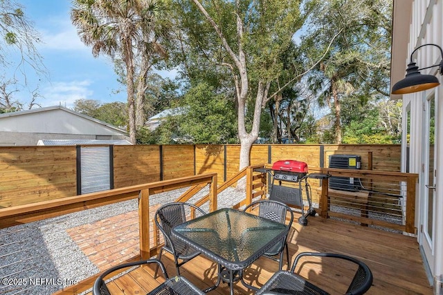 66 Oneida St, Saint Augustine, FL 32084 - deck featuring outdoor dining space and a fenced backyard