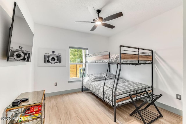 66 Oneida St, Saint Augustine, FL 32084 - bedroom featuring light wood finished floors, baseboards, and ceiling fan