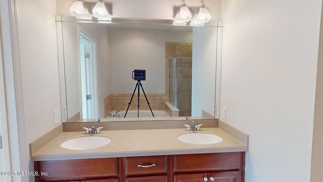 4480 Deerwood Lake Pkwy Unit 633, Jacksonville, FL 32216 - full bathroom with double vanity, a garden tub, and tiled shower