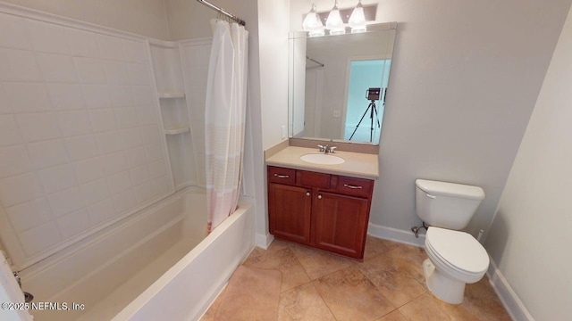 4480 Deerwood Lake Pkwy Unit 633, Jacksonville, FL 32216 - bathroom featuring shower / bath combo with shower curtain, toilet, vanity, baseboards, and tile patterned floors