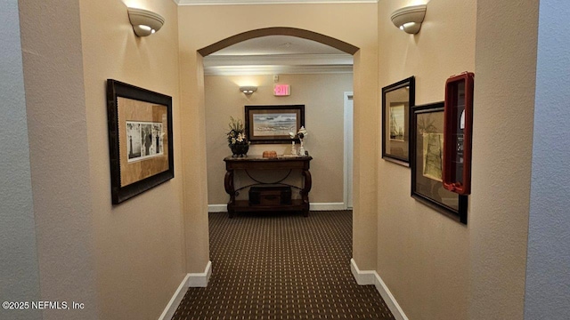 4480 Deerwood Lake Pkwy Unit 633, Jacksonville, FL 32216 - hall with ornamental molding, arched walkways, dark colored carpet, and baseboards