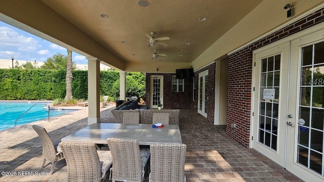 4480 Deerwood Lake Pkwy Unit 633, Jacksonville, FL 32216 - view of patio / terrace with french doors and a ceiling fan