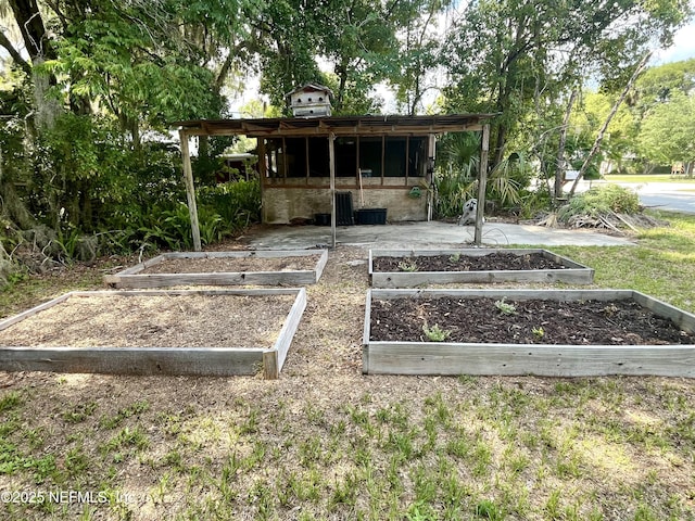 5000 Elm St, Welaka, FL 32189 - view of yard featuring a vegetable garden