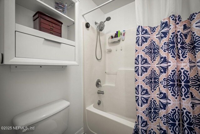 12 Roxland Ln, Palm Coast, FL 32164 - bathroom with toilet and shower / bath combo with shower curtain