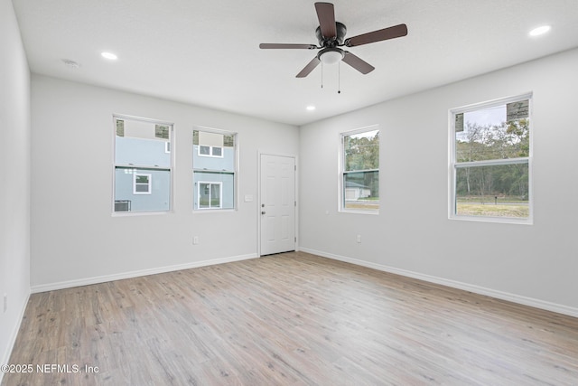 11807 Lem Turner Rd, Jacksonville, FL 32218 - empty room with light wood finished floors, a ceiling fan, baseboards, and recessed lighting