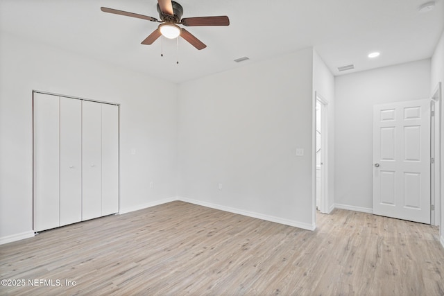 11807 Lem Turner Rd, Jacksonville, FL 32218 - unfurnished bedroom featuring light wood finished floors, baseboards, ceiling fan, a closet, and recessed lighting