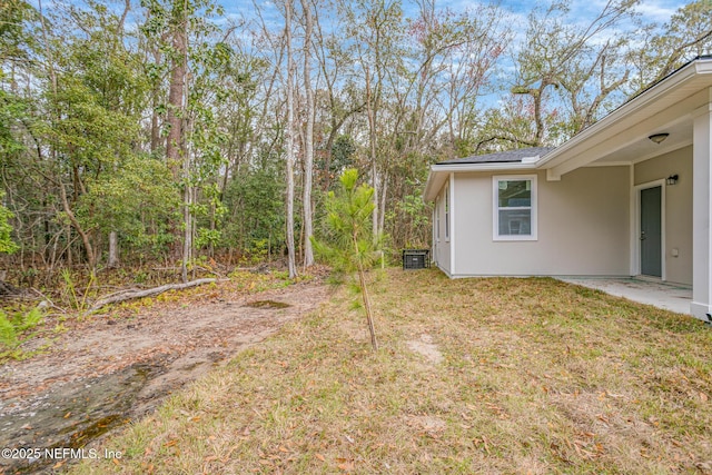 11807 Lem Turner Rd, Jacksonville, FL 32218 - view of green lawn with central air condition unit