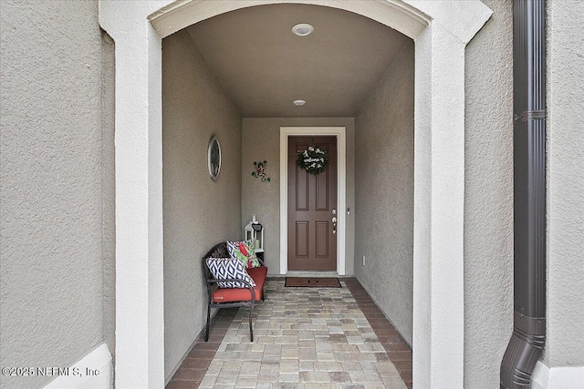 52 Bent Lake Ct, Saint Augustine, FL 32095 - doorway to property featuring stucco siding