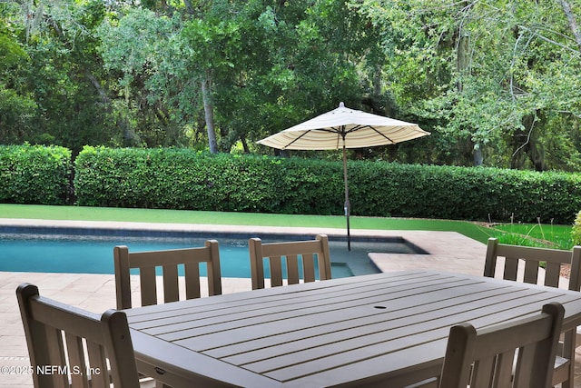 104 Hickory Hill Dr, Saint Augustine, FL 32095 - view of swimming pool featuring outdoor dining area and a patio