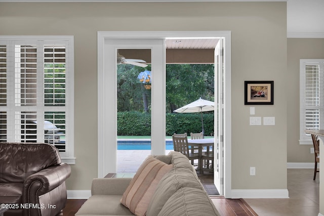104 Hickory Hill Dr, Saint Augustine, FL 32095 - living room with baseboards and crown molding