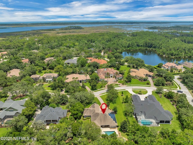 104 Hickory Hill Dr, Saint Augustine, FL 32095 - aerial view of residential area featuring a nearby body of water and a forest