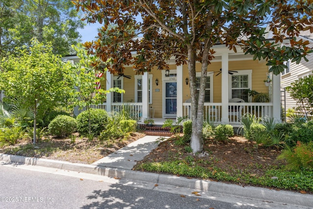 1743 Azalea St, Fernandina Beach, FL 32034 - view of front facade with a ceiling fan and a porch