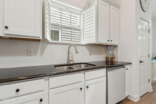 1743 Azalea St, Fernandina Beach, FL 32034 - kitchen featuring a sink, dishwasher, white cabinetry, and backsplash