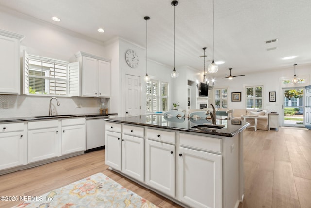 1743 Azalea St, Fernandina Beach, FL 32034 - kitchen with a sink, stainless steel dishwasher, ceiling fan, open floor plan, and recessed lighting